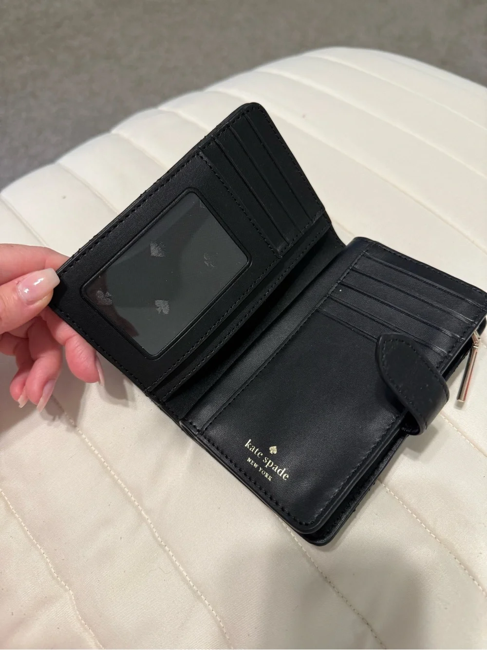 kate spade quilted black leather phone wallet with gold logo